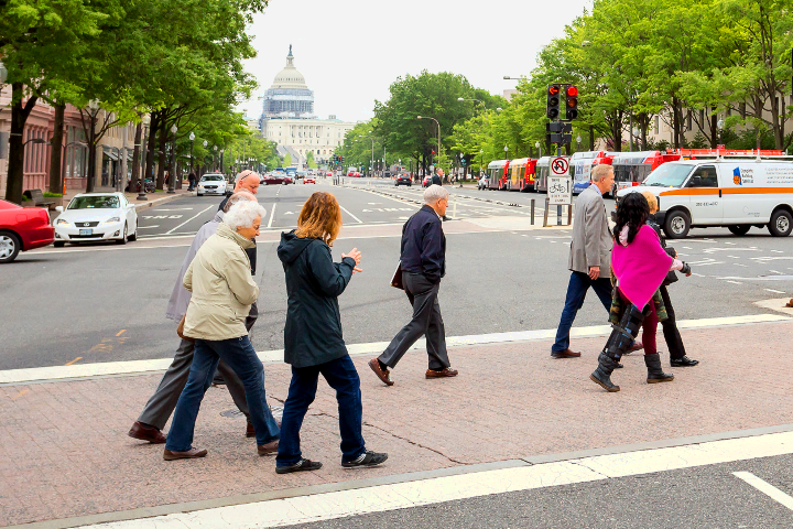 Pedestrians walking on a crosswalk in DC